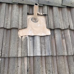 Repaired roof tile. Repaired roof tile.
