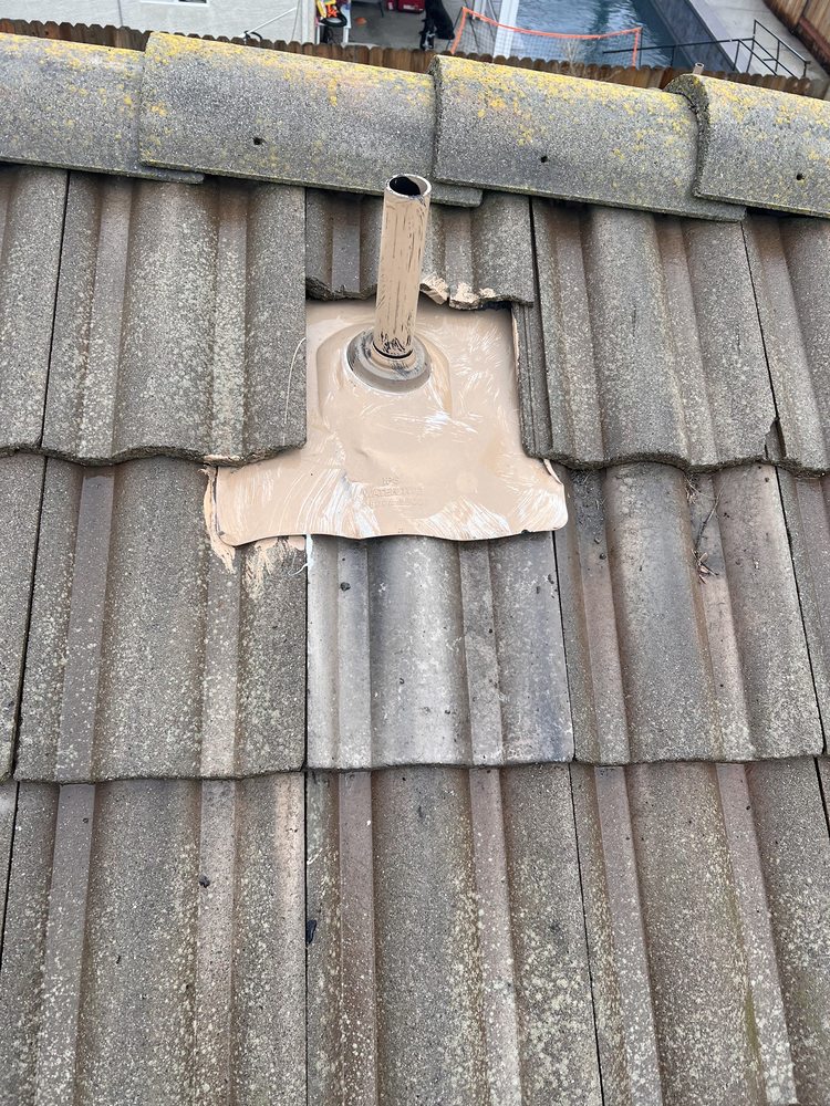 Slide of Maginis Roofing