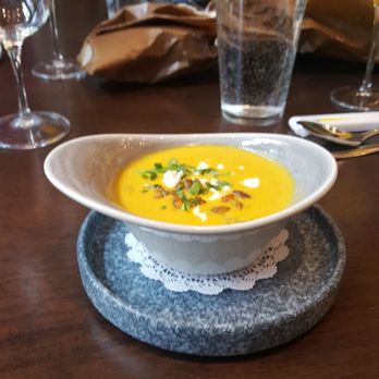 Sophy Hyde Park - A lovey squash soup.  Sophisticated comfort desk to start the meal - Hotels Near Me - Chicago, Illinois