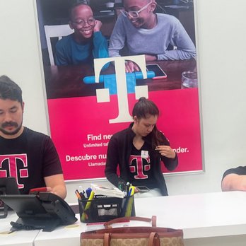 T-Mobile Authorized Retailer - The guy on the left always seems irritated that you come into the store. Of course, this is same store that closed just to watch a ballgame. - Mobile Phones Near Me - West Des Moines, Iowa T-Mobile Authorized Retailer - The guy on the left always seems irritated that you come into the store. Of course, this is same store that closed just to watch a ballgame. - Mobile Phones Near Me - West Des Moines, Iowa