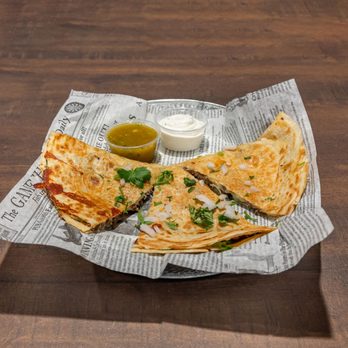 R Place - a plate of quesadillas on a table - Dive Bars Near Me - Melrose Park, Illinois
