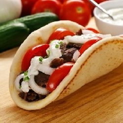 Annual Greek Festival Hosted By St George Greek Orthodox Church - Gyros savory, delish all loaded into a pita bread.