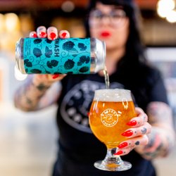 3 Sheeps Brewing - A bartender pours a beer