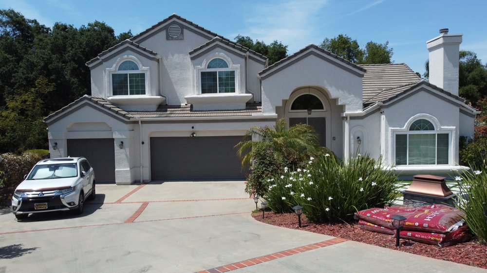 Slide of Araujo Roofing