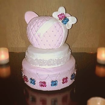 Cake Crush - a three tiered cake with a bow on top - Desserts Near Me Cake Crush - a three tiered cake with a bow on top - Desserts Near Me