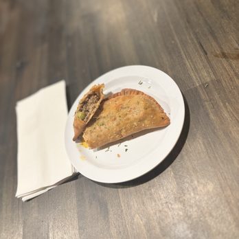 Steaming Pots - Fried Meat Pie inside view - African Near Me - Tampa, Florida