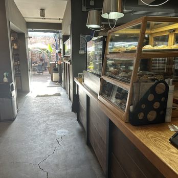Doce Cuarenta - Walking past the pastries and into the back patio - Bakeries Near Me - La Paz, BCS
