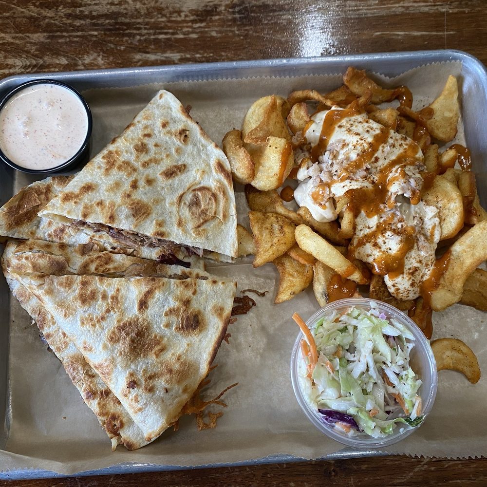 Beef briaket quesadilla with crabby fries and slaw