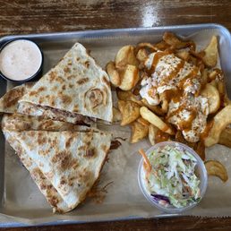 Beef briaket quesadilla with crabby fries and slaw