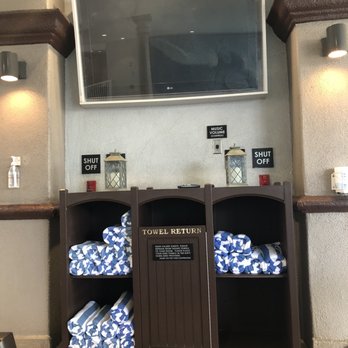 Peacock Suites - 6/2022 TV and towels at the pool area - Hotels Near Me - Anaheim, California Peacock Suites - 6/2022 TV and towels at the pool area - Hotels Near Me - Anaheim, California