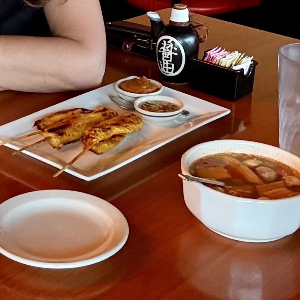 Chicken satay and tom yum soup Chicken satay and tom yum soup
