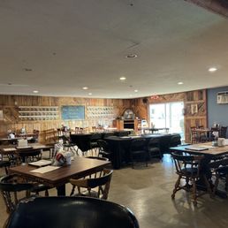 Large dinning are with mug club mugs covering the walls. Large dinning are with mug club mugs covering the walls.