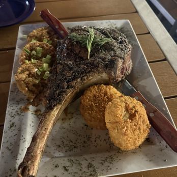 Emerald Waterfront Bar and Grill - Tomahawk steak - Steakhouses Near Me - Navarre, Florida Emerald Waterfront Bar and Grill - Tomahawk steak - Steakhouses Near Me - Navarre, Florida