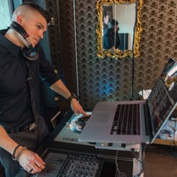 Cut throat barbershoppe Old Town - Cut Throat Barbershoppe designer, Darren Natoni, throwing down a live DJ set during the grand opening.