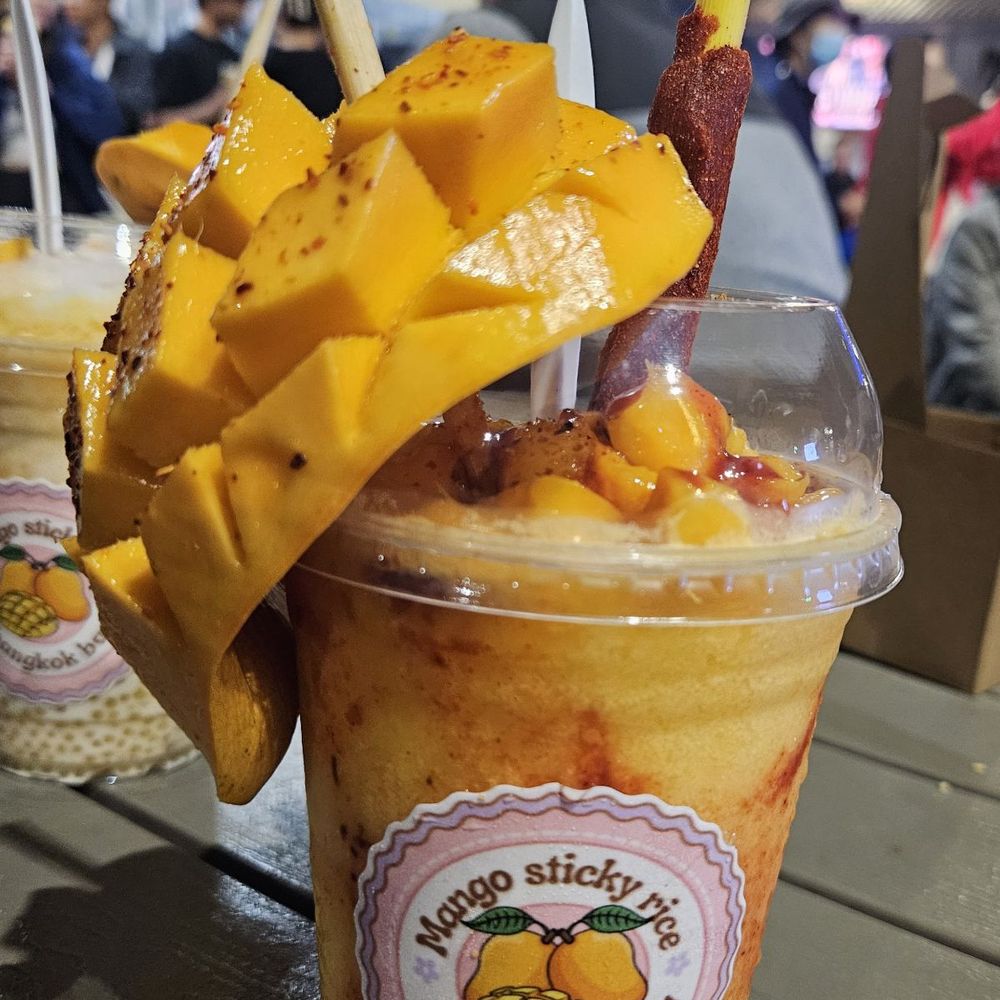 STC Rowland Legacy - Mangoneada from Mango Sticky Rice. That's fresh mango on top and inside. - Shopping Centers Near Me - Rowland Heights, California STC Rowland Legacy - Mangoneada from Mango Sticky Rice. That's fresh mango on top and inside. - Shopping Centers Near Me - Rowland Heights, California