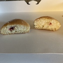Krispy Kreme - Glazed raspberry filled doughnut with little to no raspberry filling
