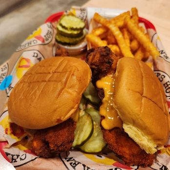Dave's Hot Chicken - Dave's #2: 2 Sliders w/ Fries $14.69 Sliders are served on a potato bun with kale slaw, pickles and drizzled with Dave's sauce - Chicken Shop Near Me - Odessa, Florida