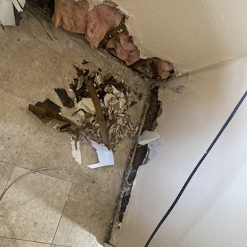 OFK Plumbing - Before photo, damage done by water leak - Plumbing Near Me