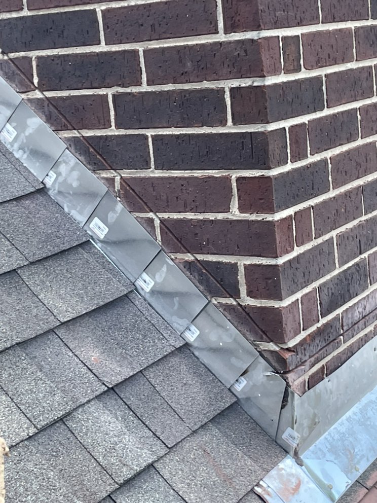 Slide of Our Lady Roofing Construction