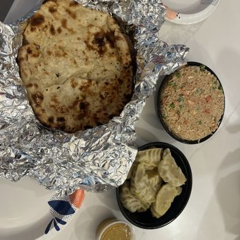 Yak & Yeti Himalayan Cuisine - Traditional Nepali Momo  Garlic Naan Chicken Fried Rice Sauce Spice Level 2 - Himalayan/Nepalese Near Me - Evansville, Indiana