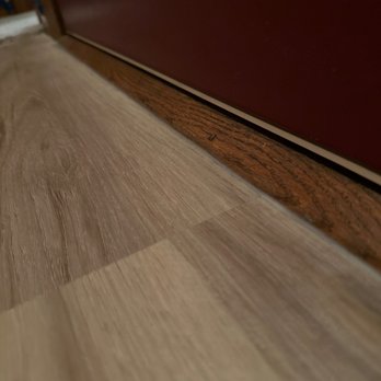 Dave Strebbing Tile and Stone - LVP placed by the front entry way of my home. Look at the caulk finish! Stellar job, highly recommend - Flooring Near Me - Rochester, Minnesota Dave Strebbing Tile and Stone - LVP placed by the front entry way of my home. Look at the caulk finish! Stellar job, highly recommend - Flooring Near Me - Rochester, Minnesota