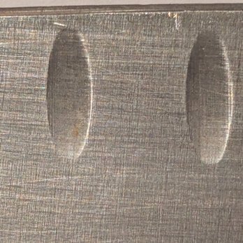 Simply Sharp - Santoku knife before sharpening with a small nick in the bevel - Knife Sharpening Near Me - Arlington, Massachusetts Simply Sharp - Santoku knife before sharpening with a small nick in the bevel - Knife Sharpening Near Me - Arlington, Massachusetts
