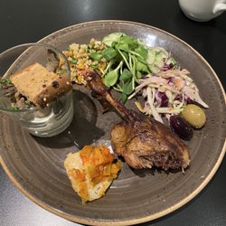 Le Vivoir - Dinner with duck and a piece of white fish. Appetizer was goat cheese in the cup with cooked mushrooms and onion on top. It was so lovely!