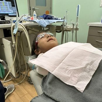Blooming Smiles - My daughter waiting patiently watching while watching Toy Story 4 - Orthodontists Near Me - Northridge, California Blooming Smiles - My daughter waiting patiently watching while watching Toy Story 4 - Orthodontists Near Me - Northridge, California