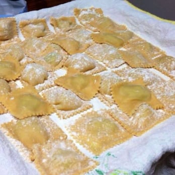 Ponti Rossi - a tray of ravioli being prepared - Italian Near Me Ponti Rossi - a tray of ravioli being prepared - Italian Near Me