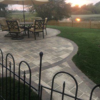 Elias Services - a patio with a table and chairs - Landscaping Near Me - Crystal Lake, Illinois Elias Services - a patio with a table and chairs - Landscaping Near Me - Crystal Lake, Illinois