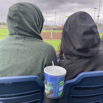 Hillsboro Stadium - Poor placement of cup holders. Thank goodness these people are wearing hoodies and their hair isn't wrapped around my straw! - Stadiums & Arenas Near Me - Hillsboro, Oregon Hillsboro Stadium - Poor placement of cup holders. Thank goodness these people are wearing hoodies and their hair isn't wrapped around my straw! - Stadiums & Arenas Near Me - Hillsboro, Oregon