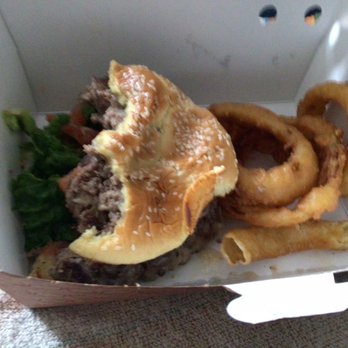 The Burger Den - As you can see, well, done burger.. Side of onion rings $1.79 - Food Delivery Services Near Me - Sacramento, California The Burger Den - As you can see, well, done burger.. Side of onion rings $1.79 - Food Delivery Services Near Me - Sacramento, California