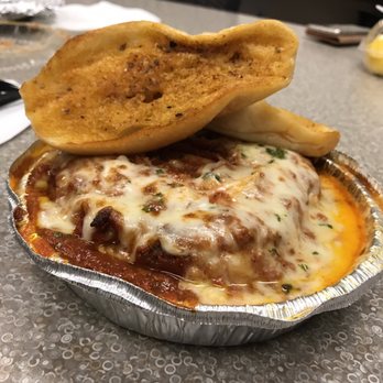 Cortina's Orange - Baked lasagna with garlic bread - Italian Near Me - Orange, California Cortina's Orange - Baked lasagna with garlic bread - Italian Near Me - Orange, California