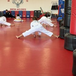 Best US Tae Kwon Do Academy & Martial Arts Center - Stretching before class. Instructors are great!