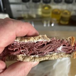 Pop's Italian Beef - Pop's Hot Carving Station Corned Beef Brisket on Rye with Swiss cheese.