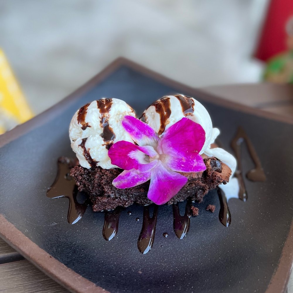 Loft 94 - a chocolate dessert with a flower on top - Tapas/Small Plates Near Me - Jamul, California Loft 94 - a chocolate dessert with a flower on top - Tapas/Small Plates Near Me - Jamul, California