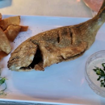 Amal - My favorite: whole fried Seabream with tahini sauce and pita chips. - Lebanese Near Me - Miami, Florida Amal - My favorite: whole fried Seabream with tahini sauce and pita chips. - Lebanese Near Me - Miami, Florida