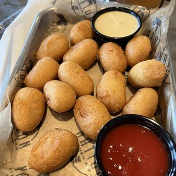 Nation Milford - Mini Corn Dogs with an outstanding sriracha ketchup - American Near Me - Milford, Ohio Nation Milford - Mini Corn Dogs with an outstanding sriracha ketchup - American Near Me - Milford, Ohio