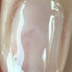 Ivy Springs Nails - Close up of the uneven base color along with the hair trapped in my nail polish