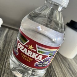 JSX - Texas water.    and a tiny tiny plastic bottle. Like, two sips and it's gone.