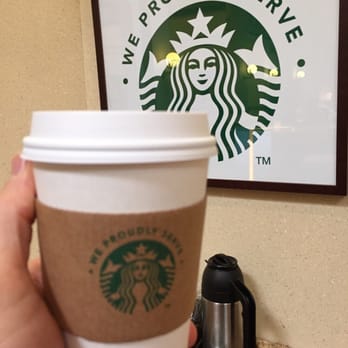 Starbucks - a hand holding a cup of coffee - Coffee & Tea Near Me - Hebron, Kentucky Starbucks - a hand holding a cup of coffee - Coffee & Tea Near Me - Hebron, Kentucky