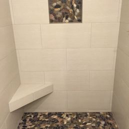 I was clueless when we started the process but I am loving my new modern shower! So spa-like!