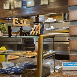 Adelinas Restaurant & Pizzaria - Photo of the Many PIZZA OVENS!  while waiting for My order. I arrived 10 minutes early due to rain!  6/2/2023