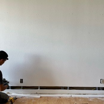 Jet’s Electrical - The process of installing electrical in the entertainment wall. Sconces, outlets, and TV with wires through wall. - Electricians Near Me Jet’s Electrical - The process of installing electrical in the entertainment wall. Sconces, outlets, and TV with wires through wall. - Electricians Near Me
