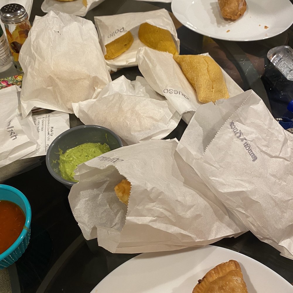 Mama's Empanadas - The mess of the table for feeding a small army - Empanadas Near Me - Astoria, New York Mama's Empanadas - The mess of the table for feeding a small army - Empanadas Near Me - Astoria, New York