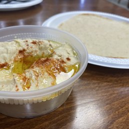 The most warm and delicate pita with absolutely incredible hummus... I love hummus & this seriously is the best I have had in my life!!! The most warm and delicate pita with absolutely incredible hummus... I love hummus & this seriously is the best I have had in my life!!!