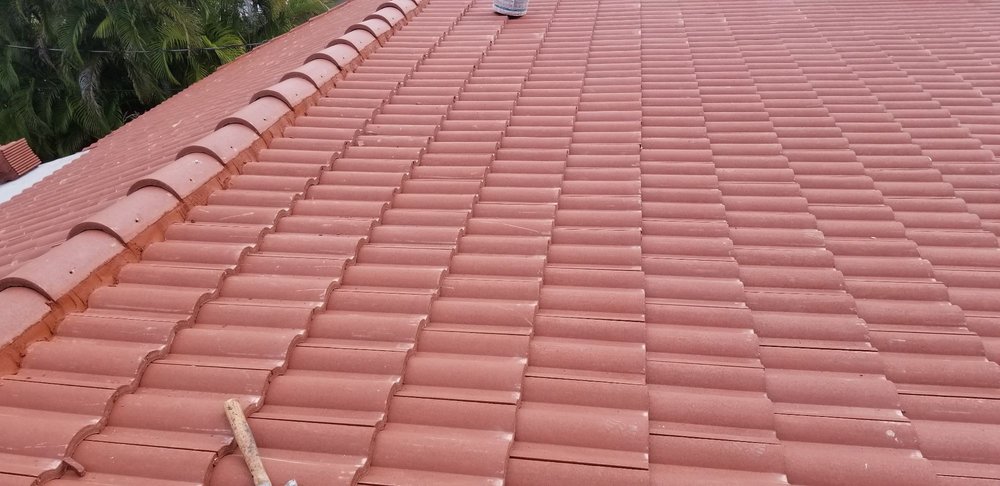 Slide of Priceless Roofing