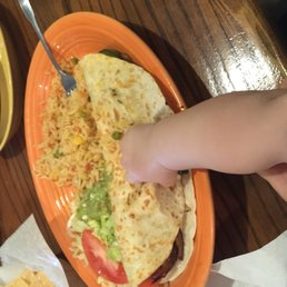 Enormous, delicious veggie quesadilla. Baby hand for scale Enormous, delicious veggie quesadilla. Baby hand for scale