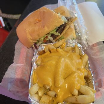 Daiquiris & Company - Hamburger po-boy and cheese fries! - Drive-Thru Bars Near Me - New Orleans, Louisiana Daiquiris & Company - Hamburger po-boy and cheese fries! - Drive-Thru Bars Near Me - New Orleans, Louisiana
