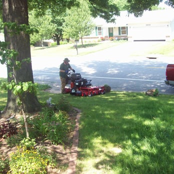 TJW Landscaping - a man mowing the lawn - Landscaping Near Me - Saint Peters, Missouri TJW Landscaping - a man mowing the lawn - Landscaping Near Me - Saint Peters, Missouri